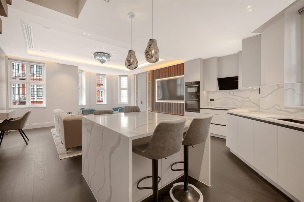 Kitchen with island and integrated appliances, 18 Hans Crescent, Knightsbridge.