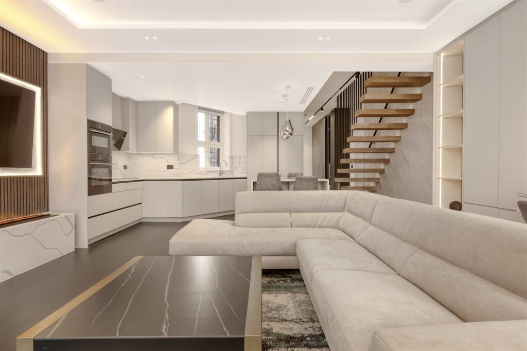 Open-plan living and dining room in a super-prime apartment at 18 Hans Crescent, Knightsbridge.