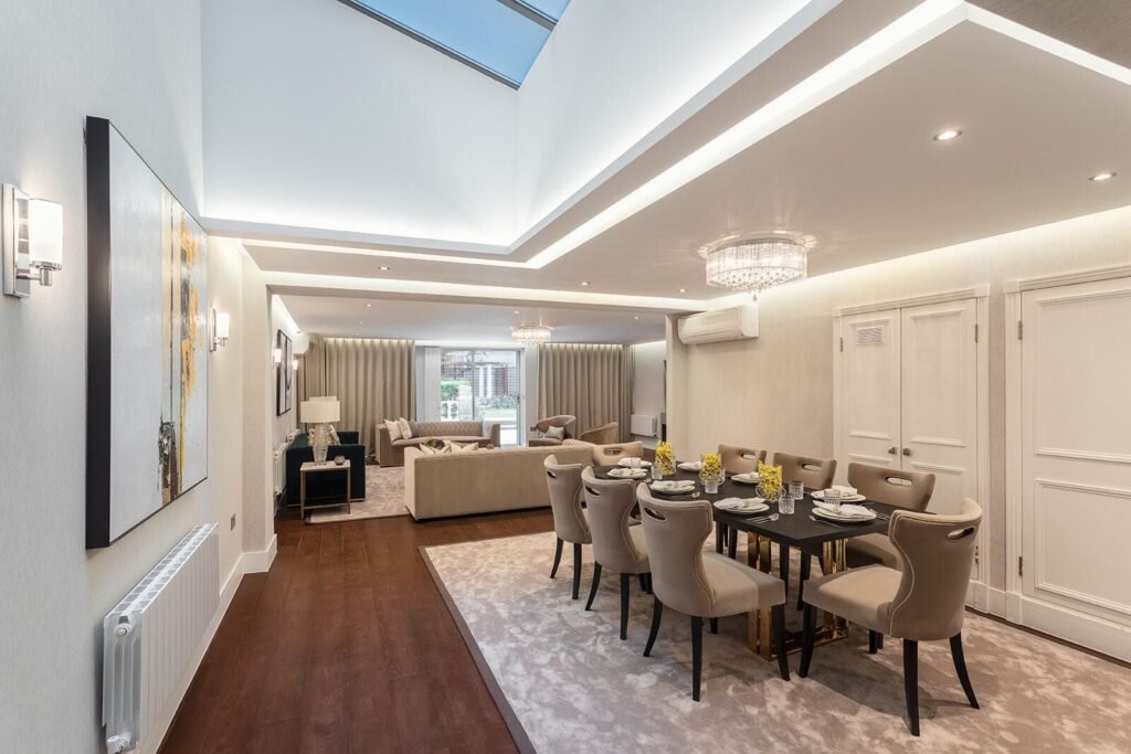 Reception room looking through to the dining room after a premium residential renovation by Elite Contracting Group, Porchester Terrace, central London.